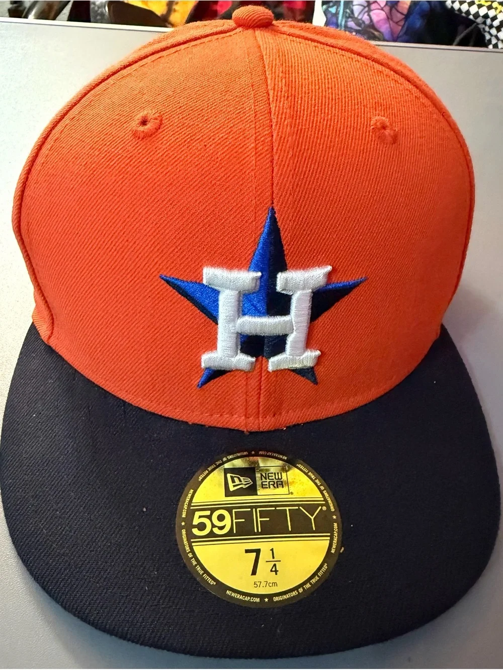 New Era Orange Crown Navy Brim Fitted Hat with White & Blue Logo